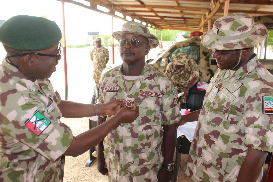 army-decorate-soldier-with-new-rank