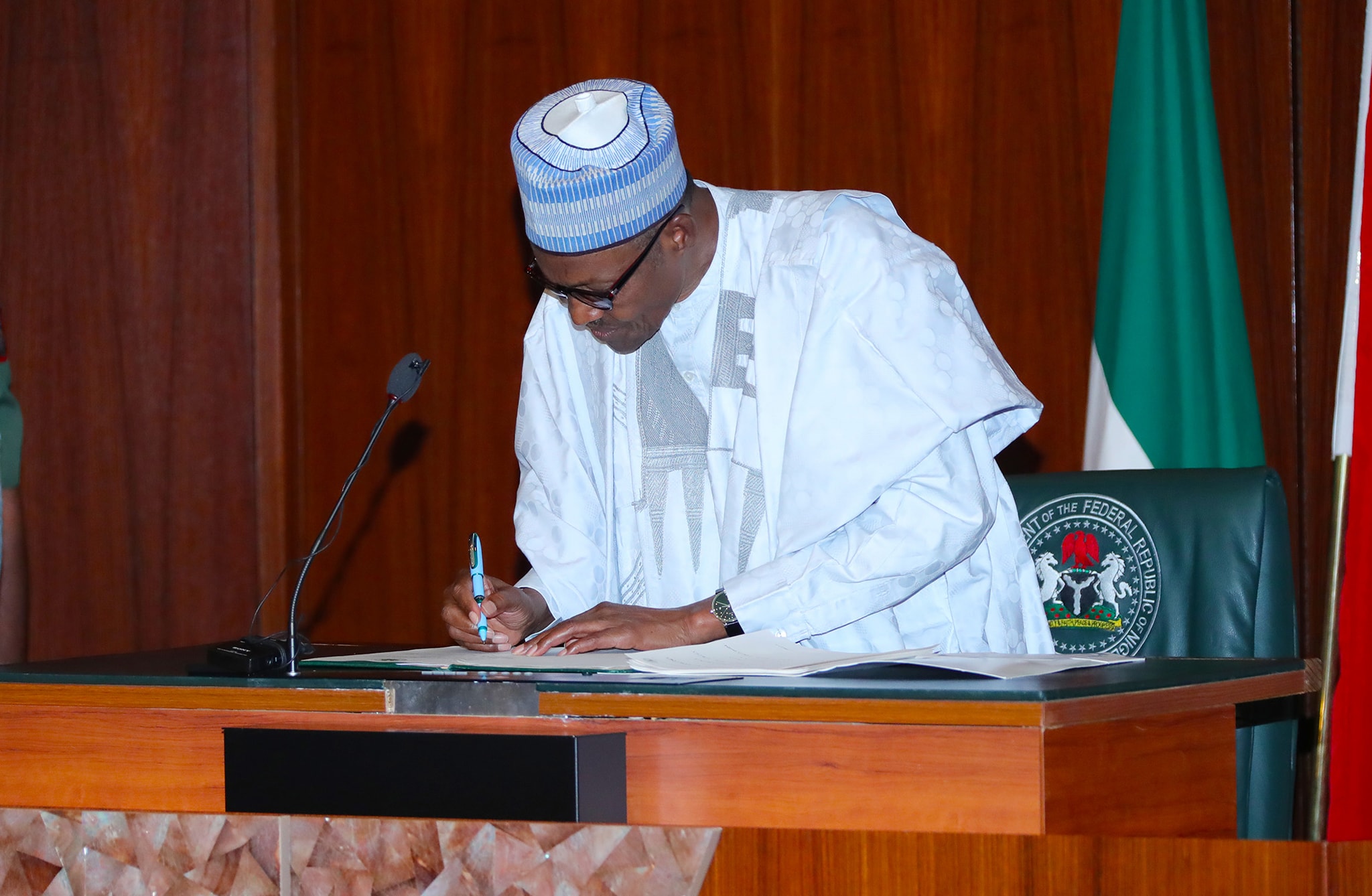 buhari-sign President Buhari Signs Law Banning Discrimination Against Persons With Disability