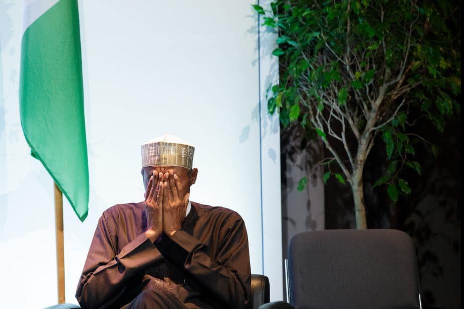 buhari-covers-face Buhari's New Year Speech Shows He Has Conceded Defeat - PDP