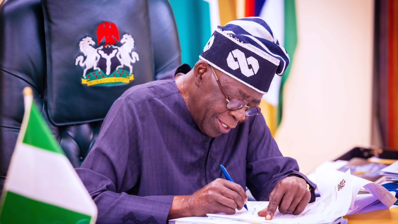 TINUBU-SIGNS-1280x720-1 President Tinubu Appoints New Chairman Of Code Of Conduct Bureau